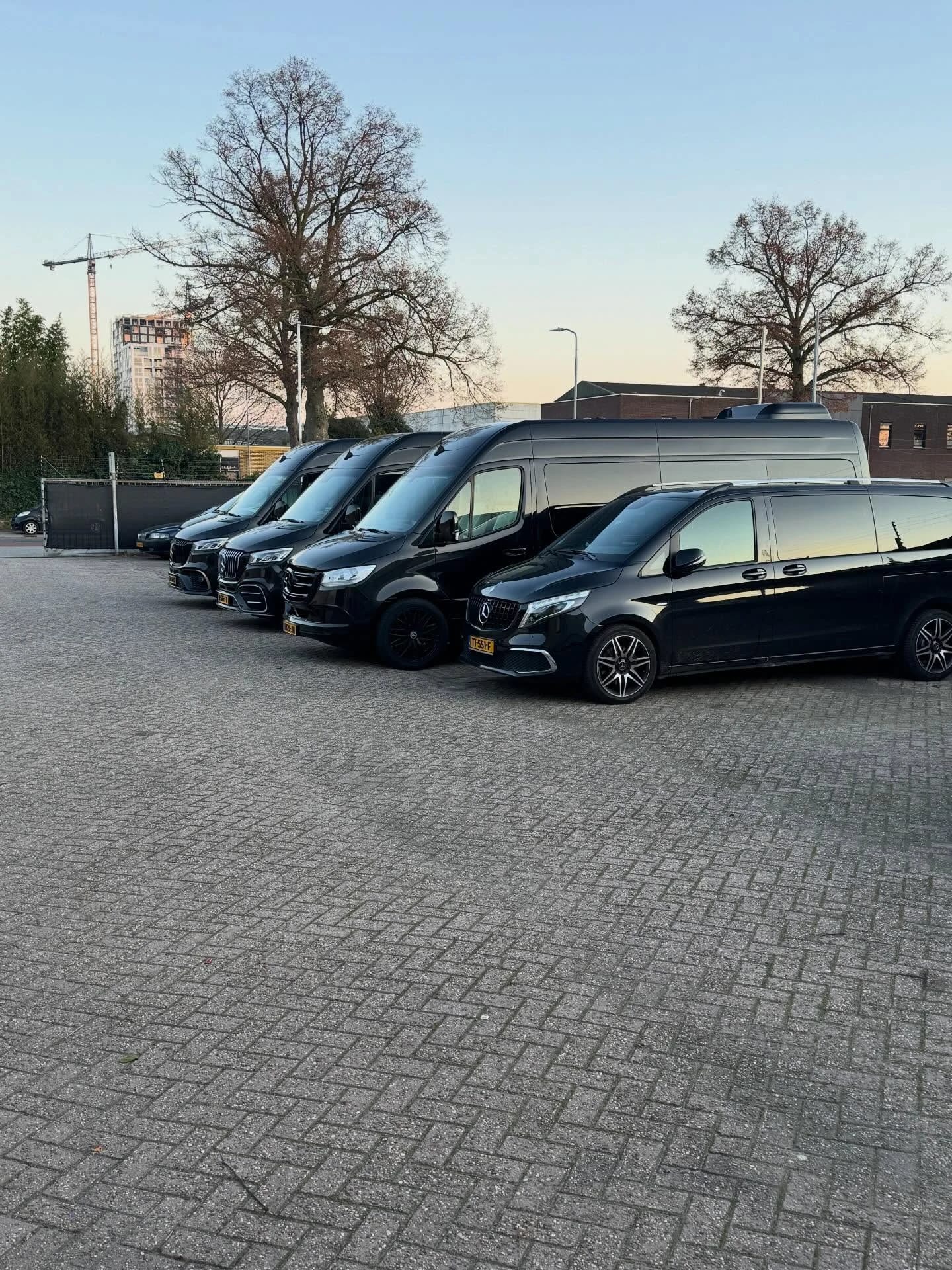 A line of black V-Protect vehicles