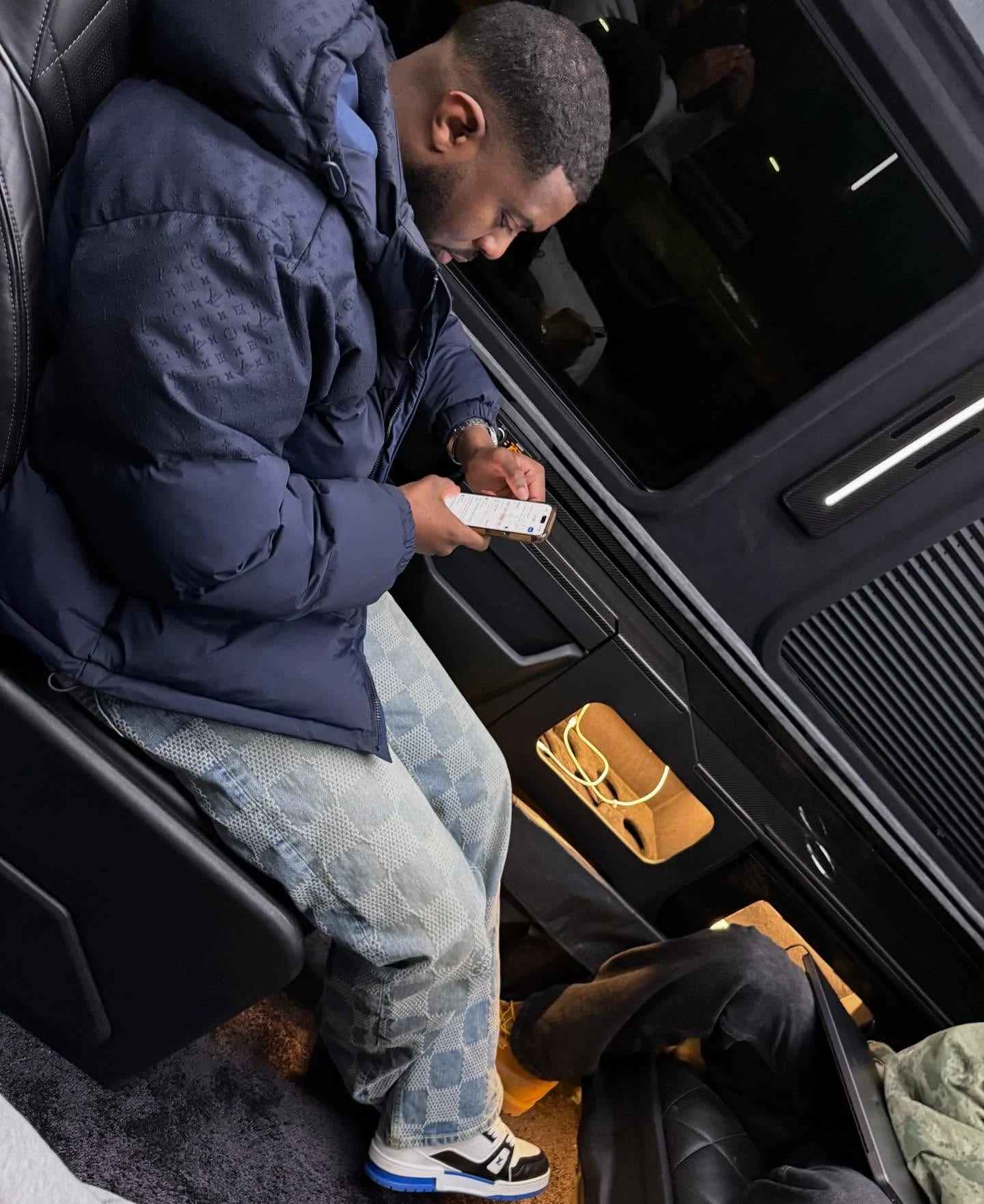A private moment inside a dark VIP interior